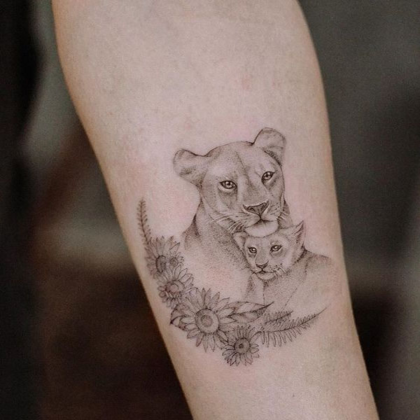 Tattoo leoa e filhote